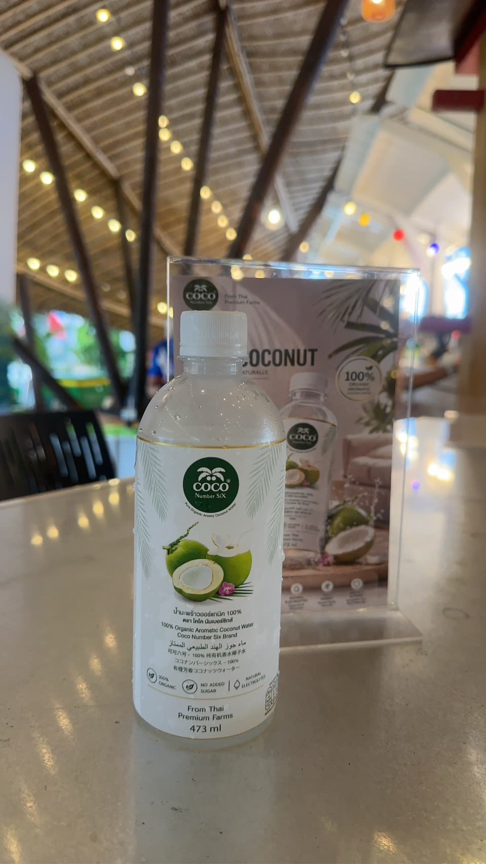 Coco Number Six bottle presented in a vertical premium product shot